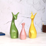 Deer Showpiece made of Ceramic - Figurine and Statues (Set of 3) (Green, Pink & Yellow)